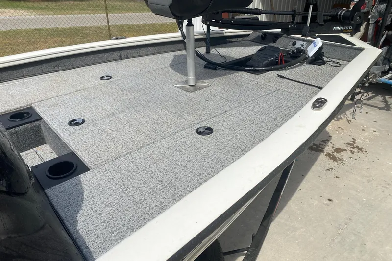 The Image of 2023 Tracker Pro Team 175 TF boat deck with fishing seat and equipment. - 9