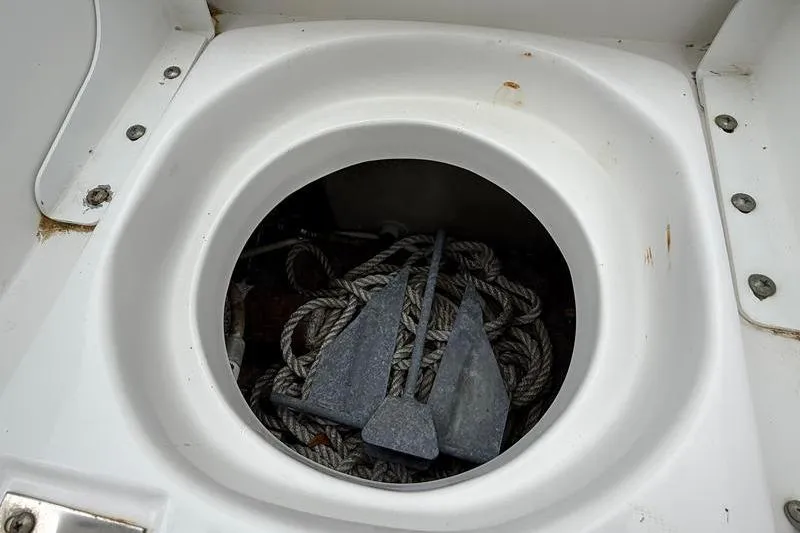 Slide: The Image of Anchor and rope storage on 2016 Sea Hunt BX 22 BR boat. - 13