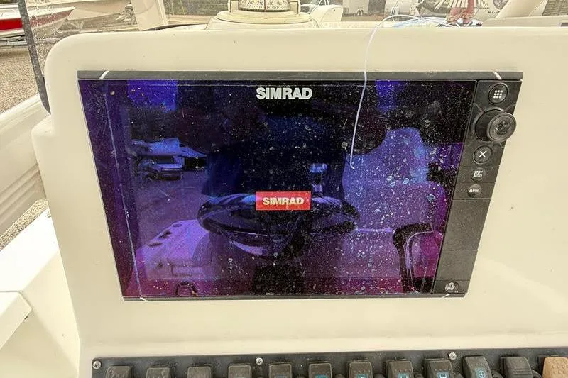 Slide: The Image of Simrad display on 2016 Sea Hunt BX 22 BR boat dashboard. - 19