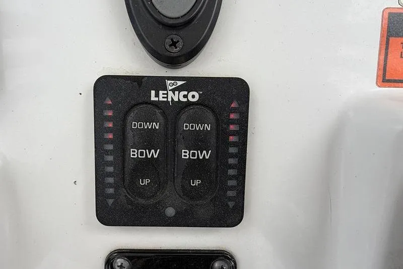 Slide: The Image of Lenco trim tab control panel on 2016 Sea Hunt BX 22 BR boat. - 22