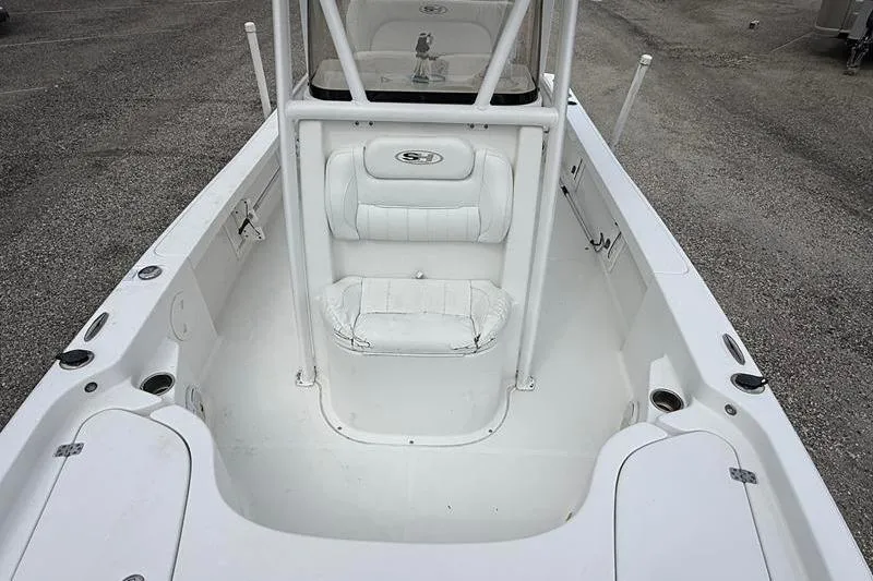 Slide: The Image of 2016 Sea Hunt BX 22 BR boat interior with white seating and console. - 35