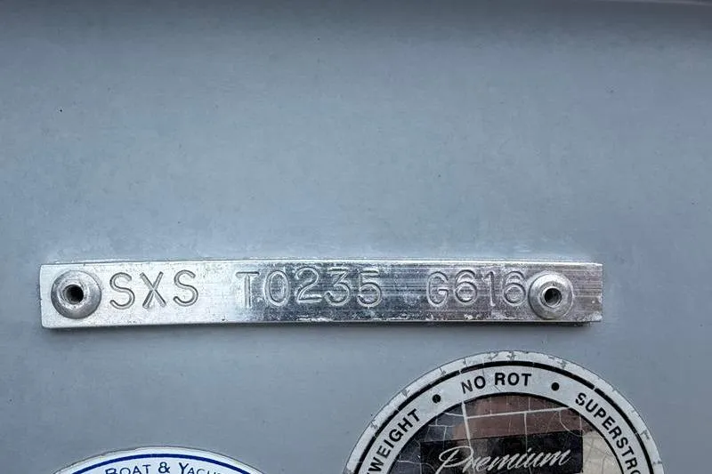 Slide: The Image of 2016 Sea Hunt BX 22 BR boat identification plate with serial number and certification stickers. - 37