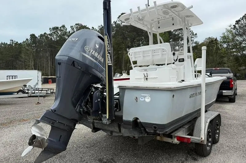 Slide: The Image of 2016 Sea Hunt BX 22 BR boat with Yamaha outboard motor on trailer. - 4