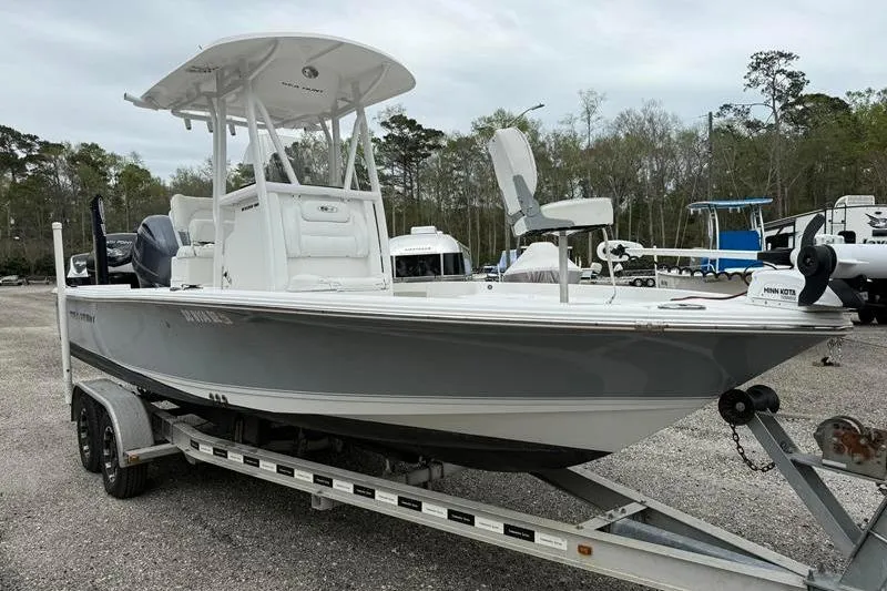 Slide: The Image of 2016 Sea Hunt BX 22 BR boat on trailer in outdoor setting. - 6