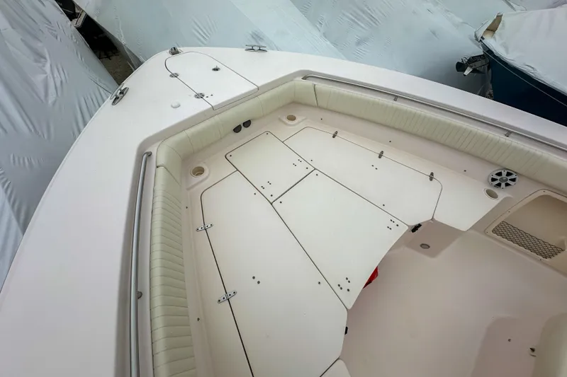 Slide: The Image of 2011 Grady-White Canyon 366 boat deck with storage compartments and seating. - 35