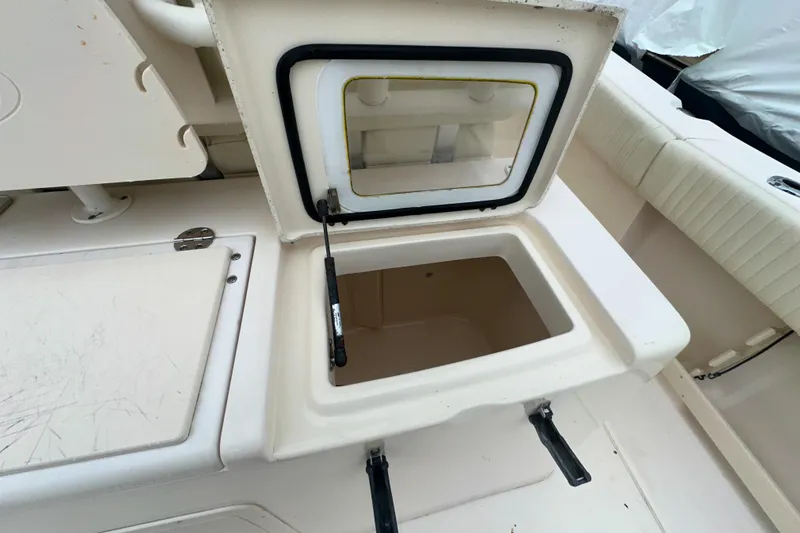 Slide: The Image of Open storage compartment on 2011 Grady-White Canyon 366 boat deck. - 41