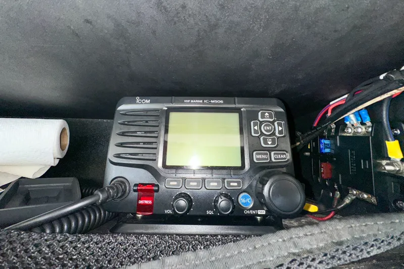 Slide: The Image of VHF marine radio IC-M506 on 2011 Grady-White Canyon 366 boat dashboard. - 42