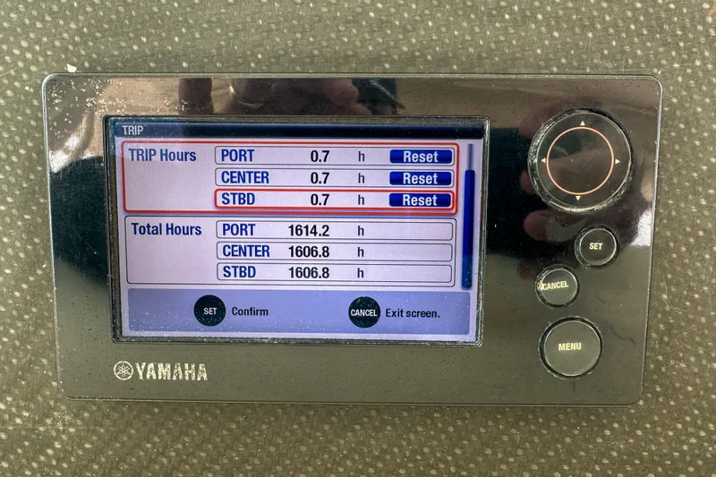 Slide: The Image of Yamaha display showing trip and total engine hours for Grady-White Canyon 366, 2011 model. - 58