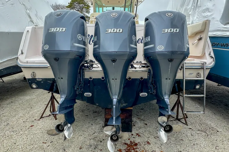 Slide: The Image of 2011 Grady-White Canyon 366 boat with triple Yamaha 300 outboard engines. - 7