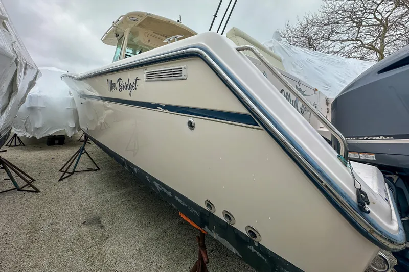 Slide: The Image of 2011 Grady-White Canyon 366 boat named "Miss Bridget" on dry dock. - 9