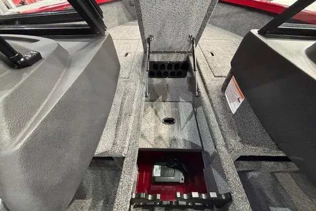 Slide: The Image of 2026 Crestliner 1750 Bass Hawk interior storage compartments and seating area. - 13