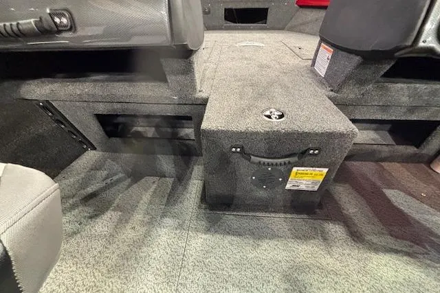 Slide: The Image of Interior view of 2026 Crestliner 1750 Bass Hawk boat, showcasing seating and storage compartments. - 14