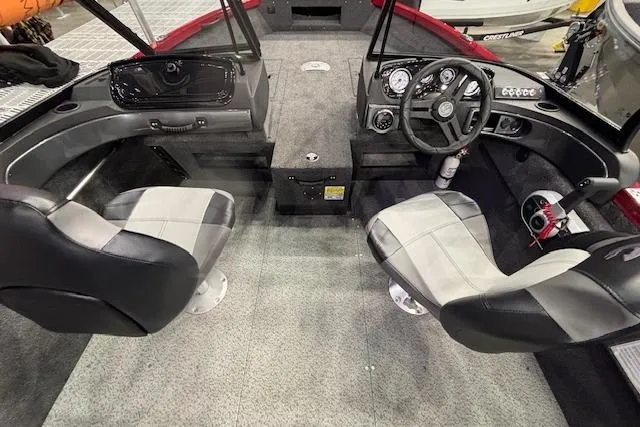 Slide: The Image of Interior of 2026 Crestliner 1750 Bass Hawk boat with dual seats and modern dashboard. - 17