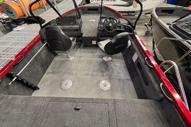 Slide: The Image of 2026 Crestliner 1750 Bass Hawk interior with dual seats and modern dashboard. - 18