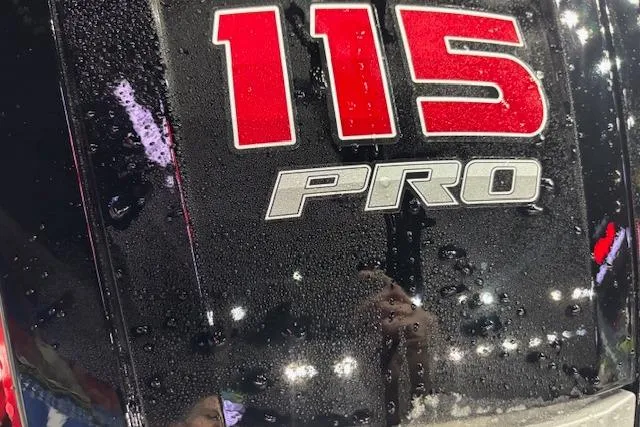 Slide: The Image of Close-up of Crestliner 1750 Bass Hawk 2026, featuring '115 PRO' engine detail. - 4