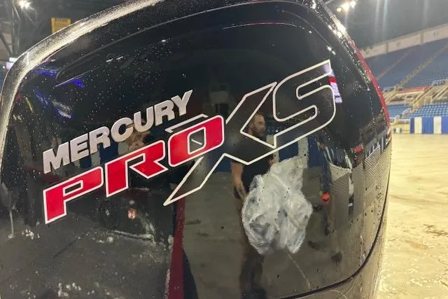 Slide: The Image of Mercury Pro XS engine on 2026 Crestliner 1750 Bass Hawk boat, indoor display. - 5