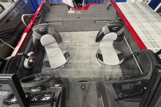 Slide: The Image of 2026 Crestliner 1750 Bass Hawk interior with dual seats and steering console. - 9
