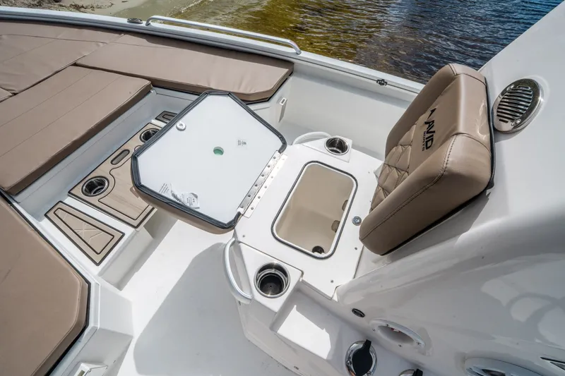 Slide: The Image of Interior of Avid 23 Fusion boat, 2026 model, featuring seating and storage area. - 19