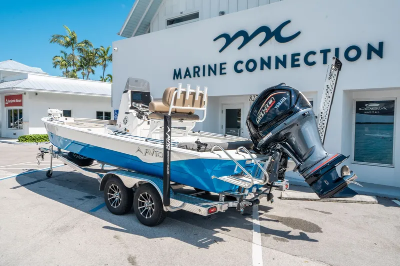 Slide: The Image of Avid 23 Fusion boat at Marine Connection, 2026 model. - 3