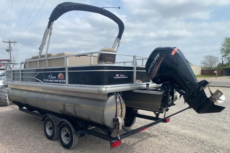 Slide: The Image of 2018 Sun Tracker Fishin' Barge 20 DLX pontoon boat with Mercury outboard motor. - 4