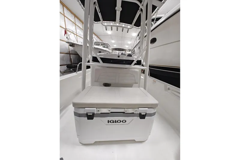 Slide: The Image of 2025 Boston Whaler 190 Montauk interior with Igloo cooler and seating. - 14