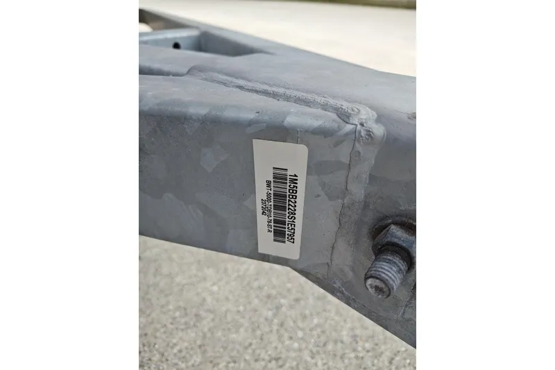 Slide: The Image of Close-up of a Boston Whaler 190 Montauk 2025 trailer with a visible serial number. - 3