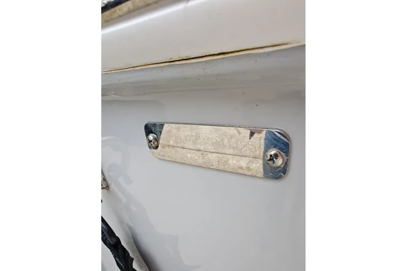 Slide: The Image of 2025 Boston Whaler 190 Montauk hull identification plate with screws. - 5