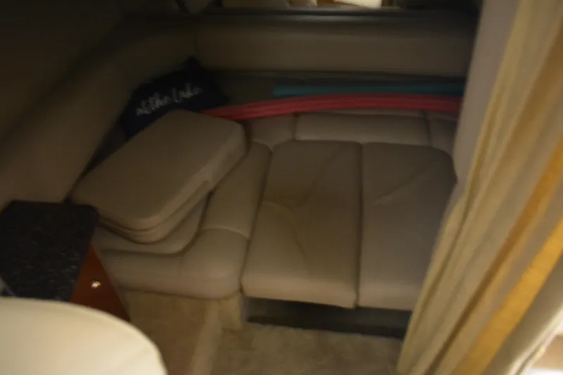 Slide: The Image of Interior cabin of a 2004 Formula 31 Performance Cruiser with beige seating. - 16