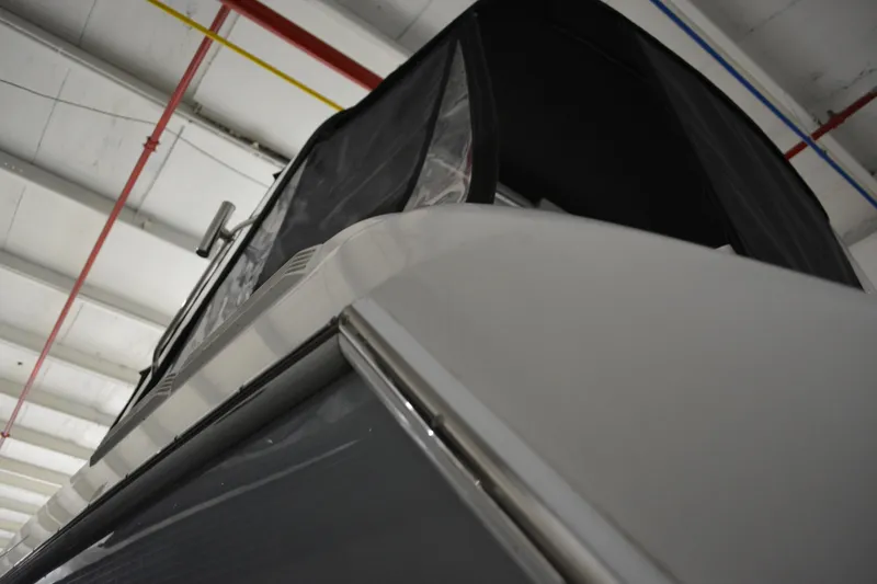 Slide: The Image of 2004 Formula 31 Performance Cruiser in storage, showcasing sleek design and structure. - 7