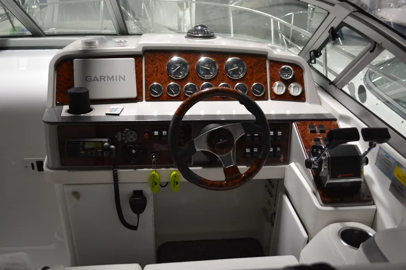 Slide: The Image of 2004 Formula 31 Performance Cruiser helm with Garmin navigation and control panel. - 8