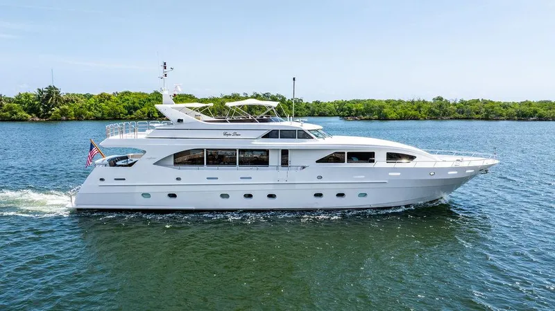 The Image of 2001 Intermarine Raised Pilothouse yacht cruising on calm waters. - 0