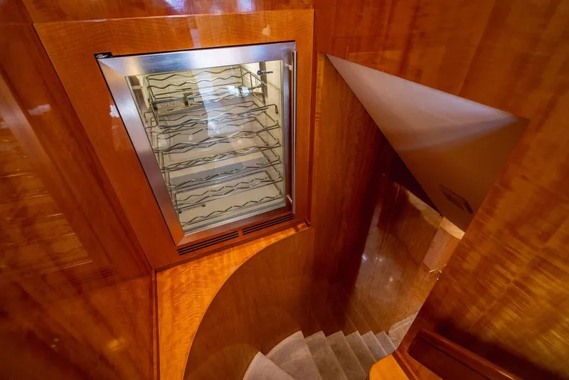 Slide: The Image of Luxurious wooden staircase and wine cooler in 2001 Intermarine Raised Pilothouse yacht. - 10