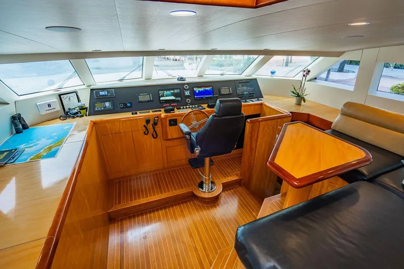 Slide: The Image of Pilothouse of a 2001 Intermarine Raised Pilothouse yacht with modern navigation equipment. - 21