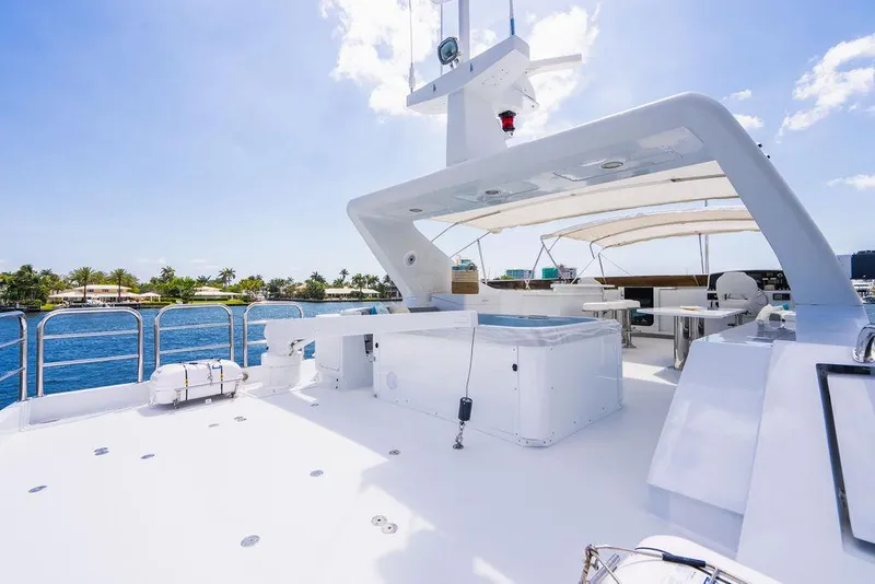 Slide: The Image of 2001 Intermarine Raised Pilothouse yacht deck with ocean view and modern amenities. - 27