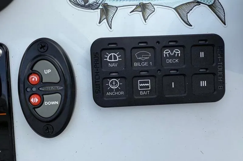 Slide: The Image of Control panel of 2025 Cayo Boatworks 180 with navigation and bilge switches. - 13