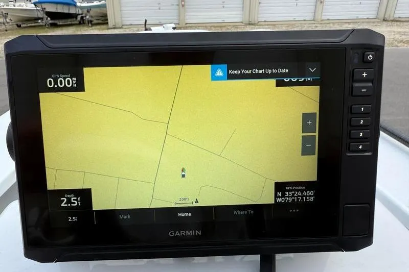 Slide: The Image of Garmin GPS display on 2025 Cayo Boatworks 180, showing navigation map and coordinates. - 14