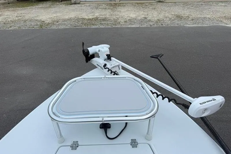 Slide: The Image of 2025 Cayo Boatworks 180 with trolling motor on deck. - 17