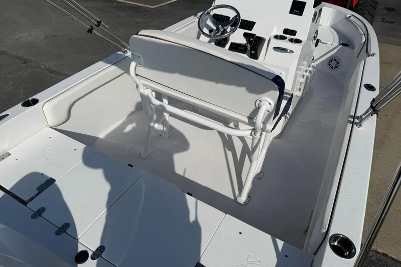 Slide: The Image of 2026 Stingray 173 CC boat interior with steering console and seating. - 6