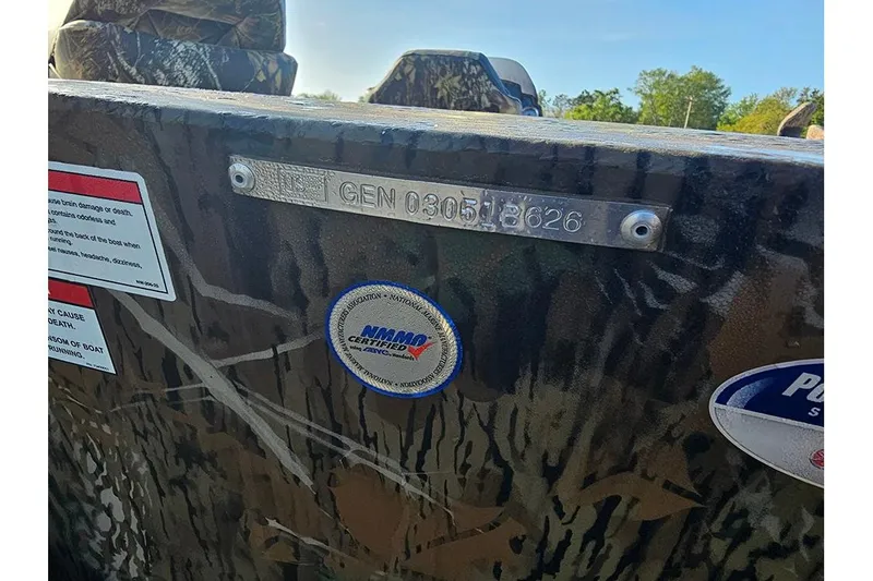 Slide: The Image of 2026 G3 Sportsman 1810 boat with camouflage design and certification labels. - 17