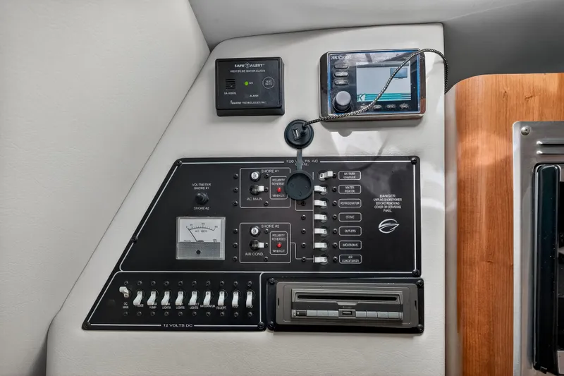 Slide: The Image of Dashboard of 2019 Crownline 264 CR with control panel. - 11
