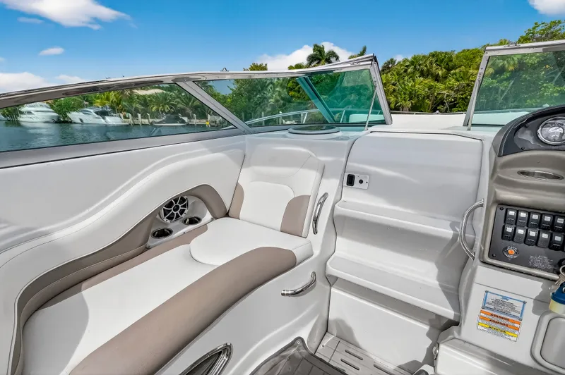 Slide: The Image of Interior of a 2019 Crownline 264 CR yacht with luxurious seating area. - 19