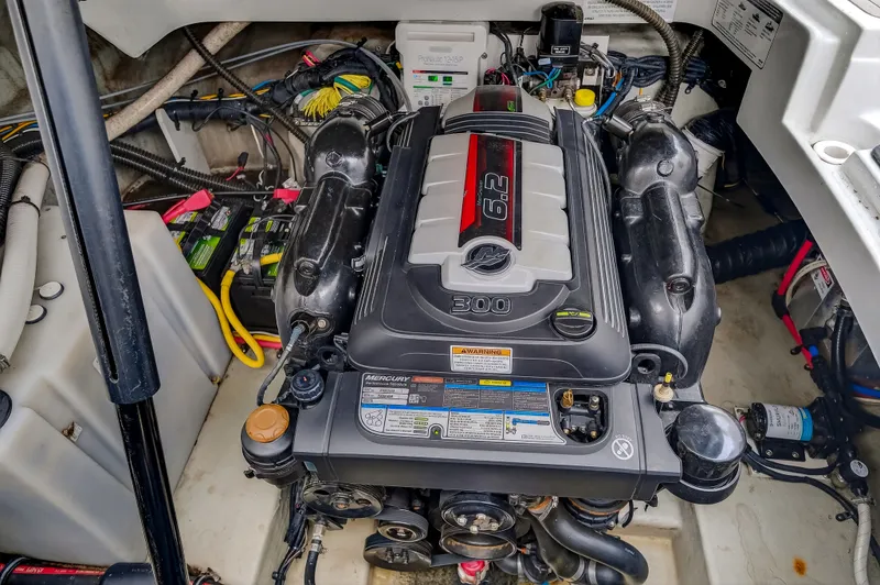 Slide: The Image of Engine compartment of a 2019 Crownline 264 CR boat with Mercury 6.2L engine. - 32
