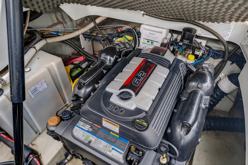 Slide: The Image of Engine compartment of a 2019 Crownline 264 CR boat with 6.2L engine. - 33