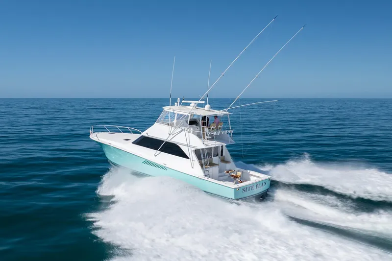 Slide: The Image of Viking 55 Convertible yacht cruising on open sea, 2000 model. - 12