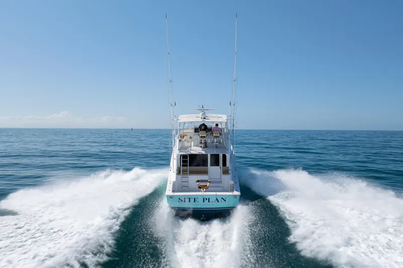 Slide: The Image of Viking 55 Convertible yacht cruising on open sea, rear view, 2000 model. - 16