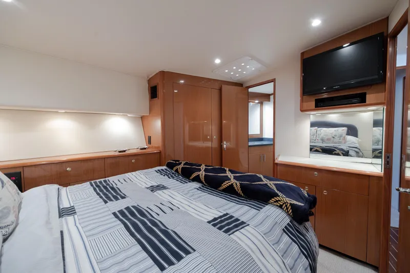 Slide: The Image of Luxurious cabin interior of 2000 Viking 55 Convertible yacht with modern amenities. - 40