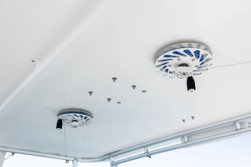 Slide: The Image of Ceiling view of a 2000 Viking 55 Convertible boat with mounted equipment. - 68