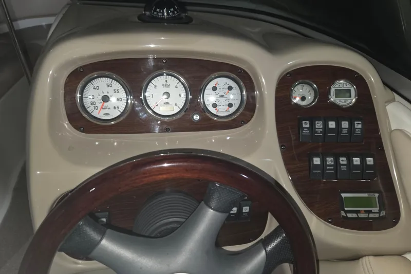 Slide: The Image of Dashboard of a 2006 Chaparral 236 SSi boat with gauges and controls. - 4