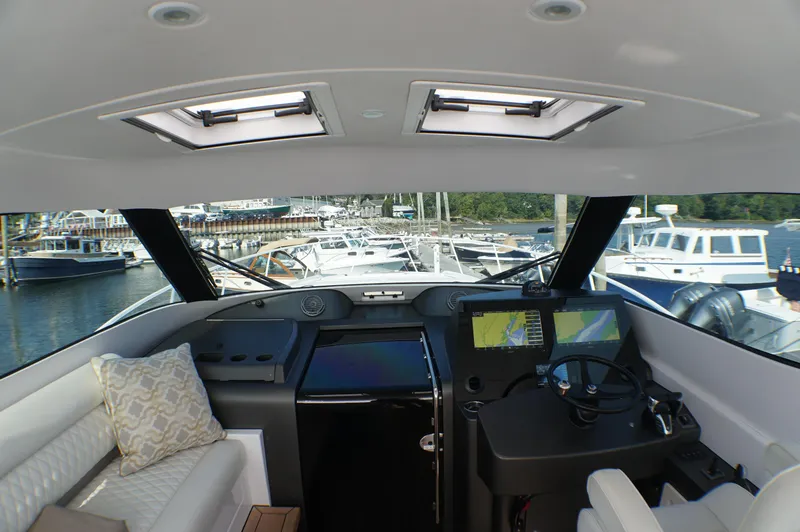 Slide: The Image of Interior view of 2021 Jupiter 41 SB yacht with modern helm console. - 12