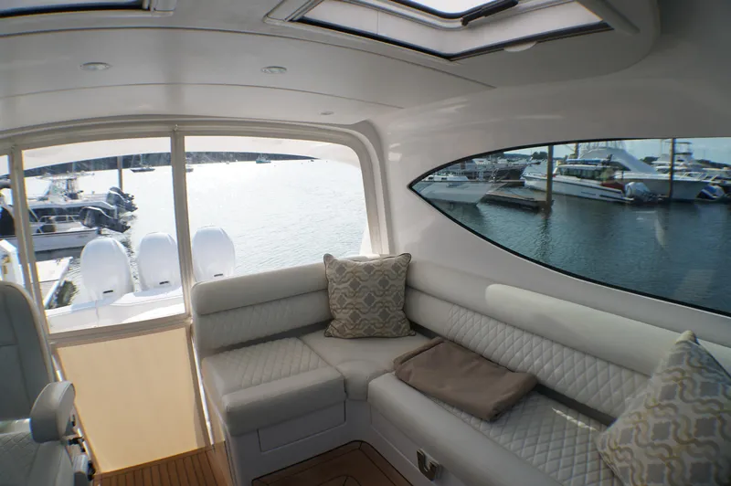 Slide: The Image of Interior of a 2021 Jupiter 41 SB yacht with luxurious seating area. - 14